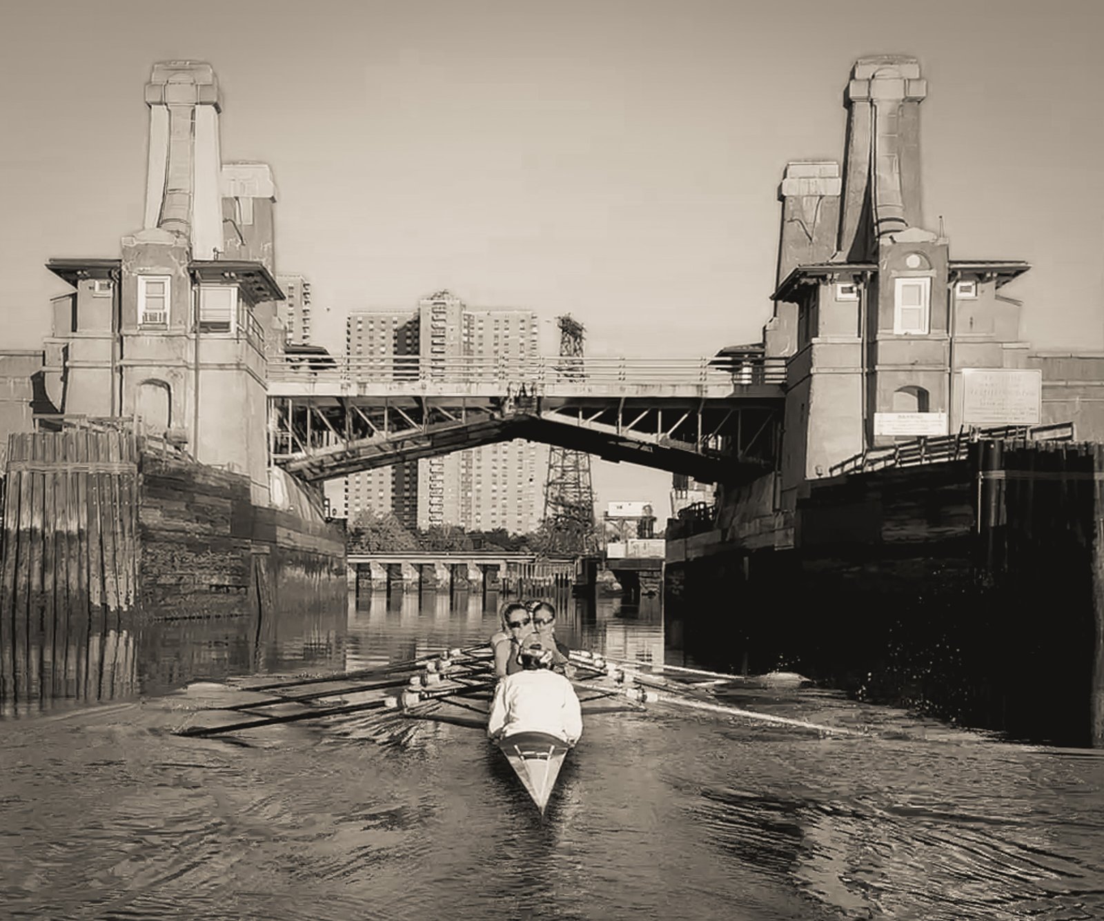 A quad under the railway bridge, in black and white