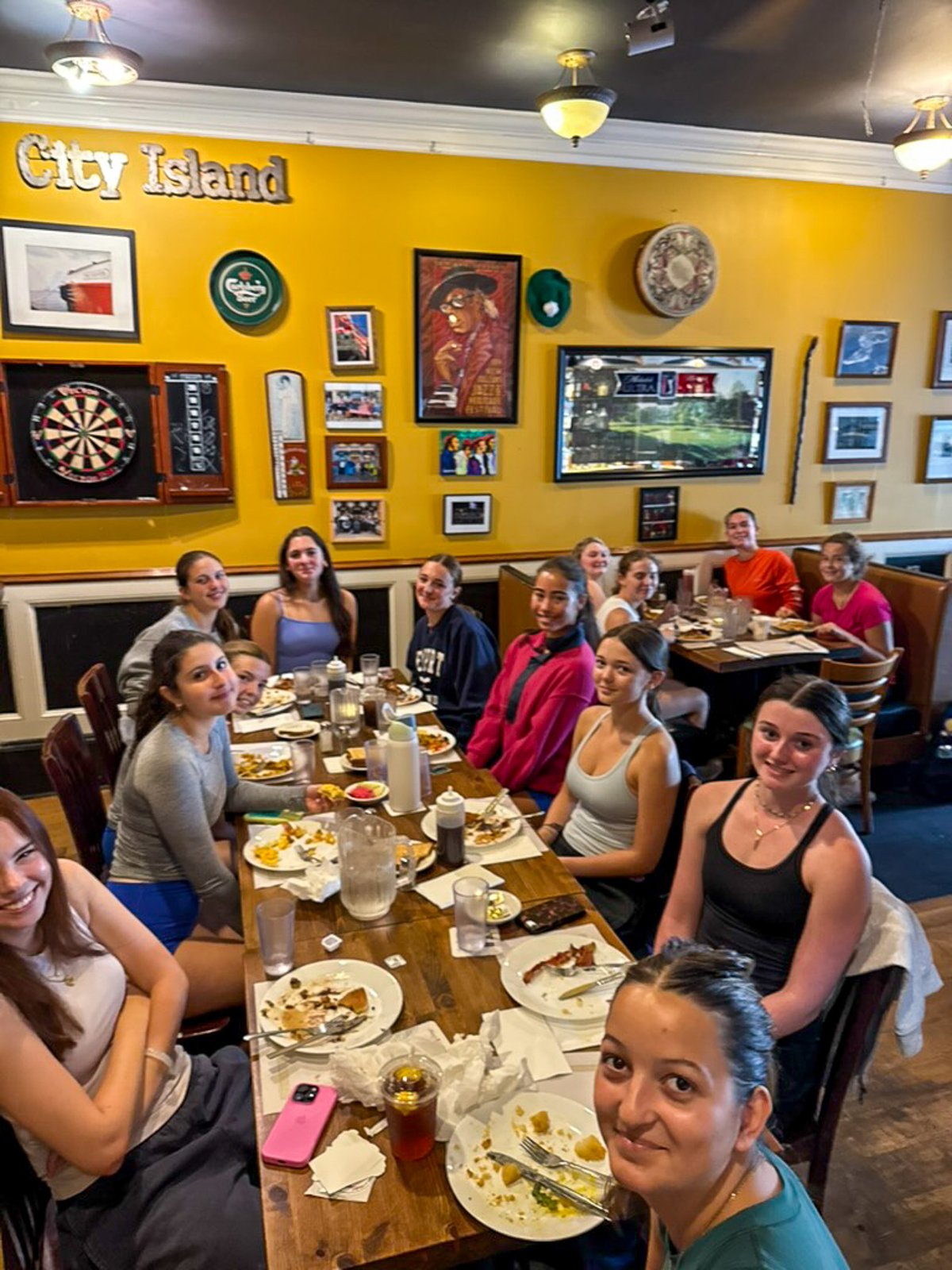 The U17 and U19 squads at the diner after Saturday practice