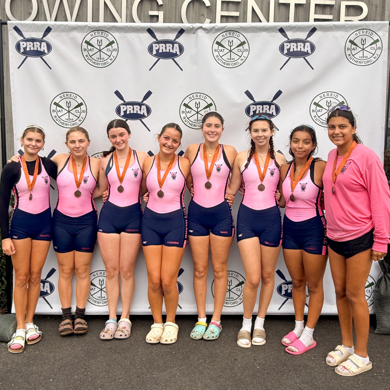 The 2V8+ with their bronze medals